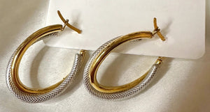 Two-tone teardrop hoop earrings, close-up detail