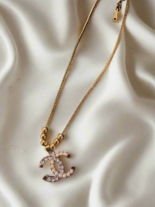 18k gold plated stainless steel necklace with stamped zipper pull