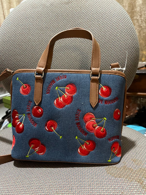 Steve Madden cherry print denim satchel, back view