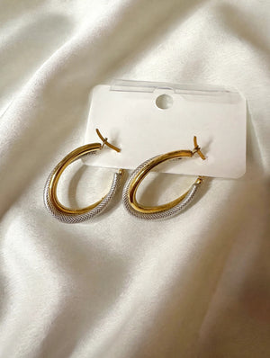 Two-tone teardrop hoop earrings, front view