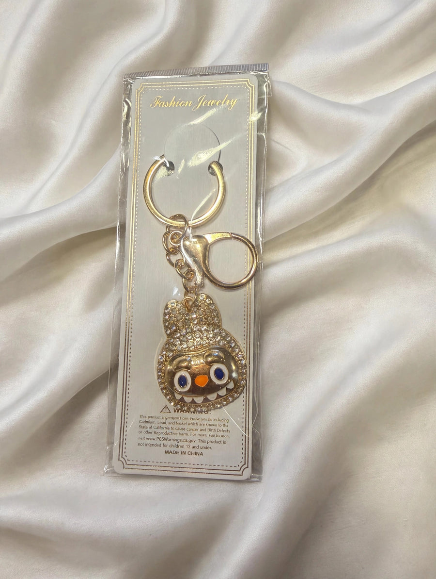 Gold Tone Crystal Rhinestone Monster Face Bag Charm Keychain with Lobster Clasp - Sparkly Purse Charm