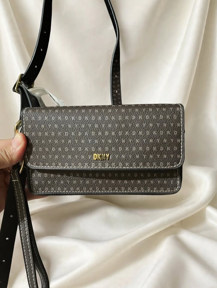 DKNY brown monogram flap crossbody bag, front view with gold logo